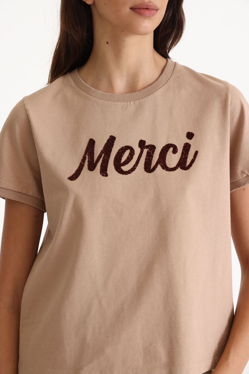 REMERA MERCI